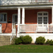 Main level porch rebuilt and painted with curved railings and new floor