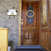Cedar door and screen door added to pine porch